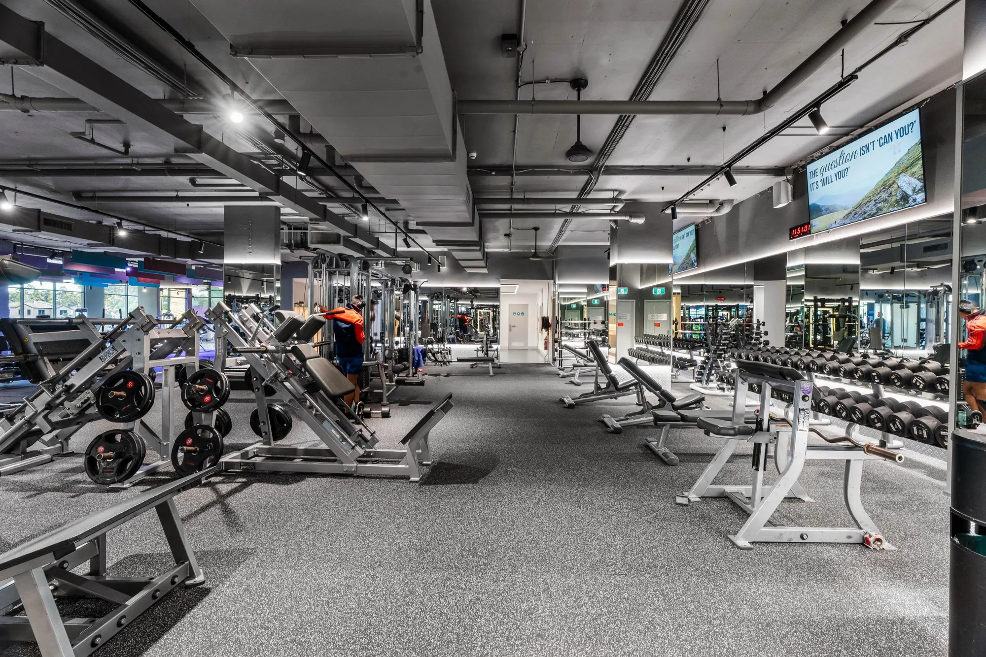 The wide training floor at the Maddimax Mascot club, beneath an exposed ceiling.